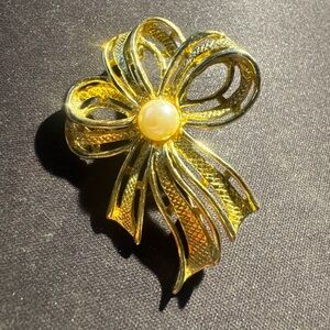 Elegant Gold and Silver Bow Brooch with Pearl Accent Vintage Napier 1980s